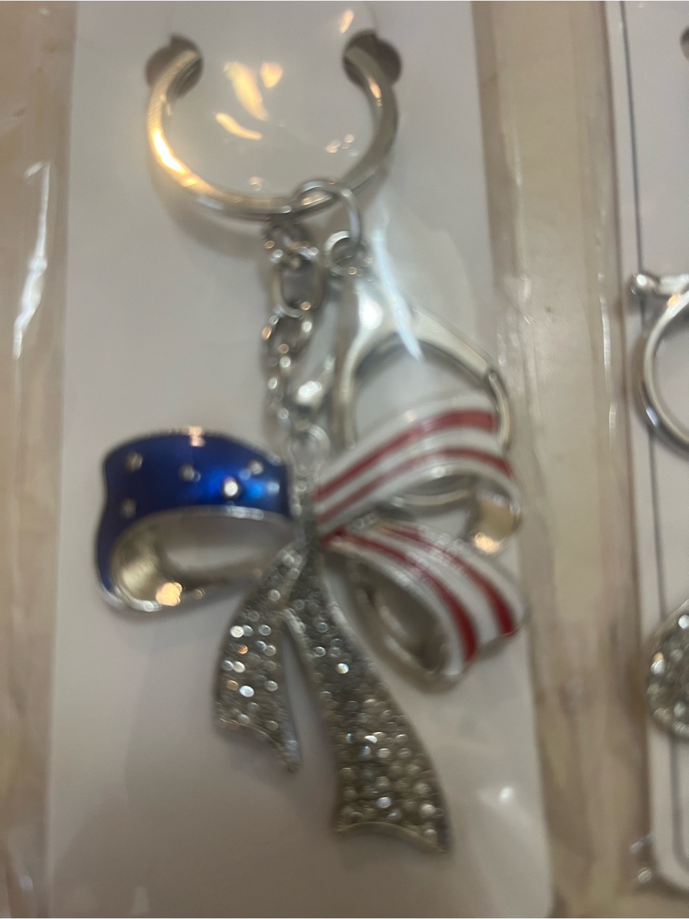 Four sparkly silver tone key chains - Picture 4 of 5